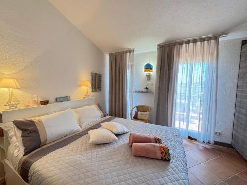 Ένα ή περισσότερα κρεβάτια σε δωμάτιο στο B&B Les Capitaineries