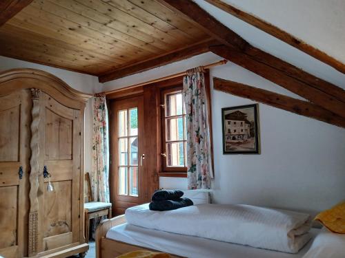 Postel nebo postele na pokoji v ubytování Chalet St Jakob
