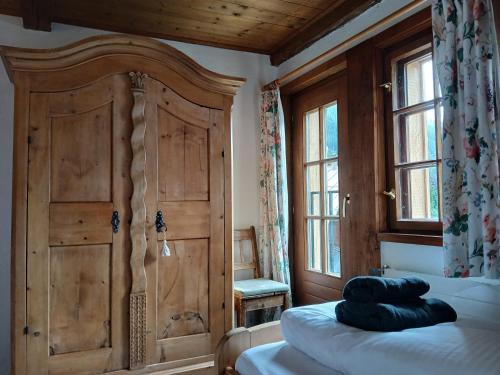 Postel nebo postele na pokoji v ubytování Chalet St Jakob