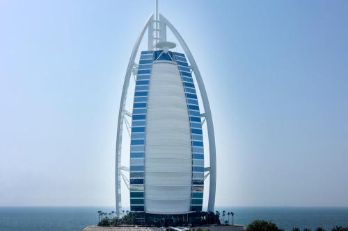 a view of the burj al arab hotel at Luxurious 3BR APT Offering Full Burj AlArab Views in Dubai