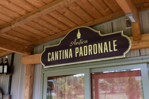 a sign on the front of a restaurant at Palagina Il Borgo Agricolo in Figline Valdarno