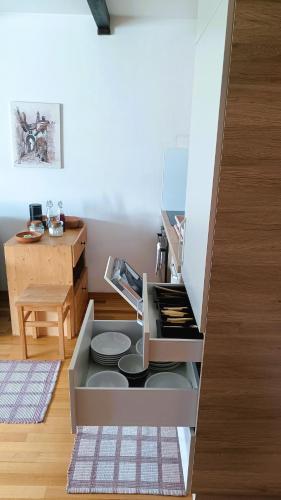 a kitchen with a stove top oven in a room at Apartma Lina in Bovec