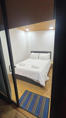 Postel nebo postele na pokoji v ubytování Rancho Las Tres Marías Hospedaje Rural Mi Refugio