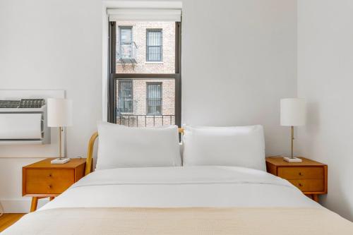 Voodi või voodid majutusasutuse Blueground Lincoln Sq gym wd nr park NYC-1848 toas