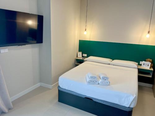 Ein Bett oder Betten in einem Zimmer der Unterkunft Osito Hub - Colomer