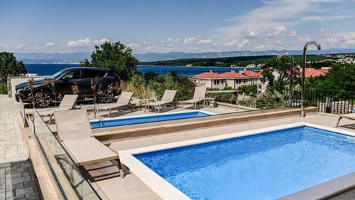 Modern 3BR Apartment with Private Pool, Sea View & Garage