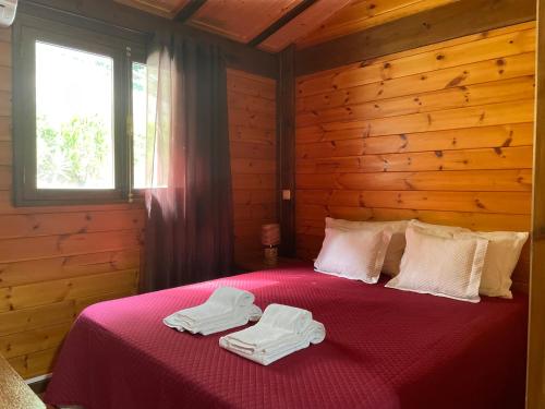 En eller flere senge i et værelse på Casa do Casal