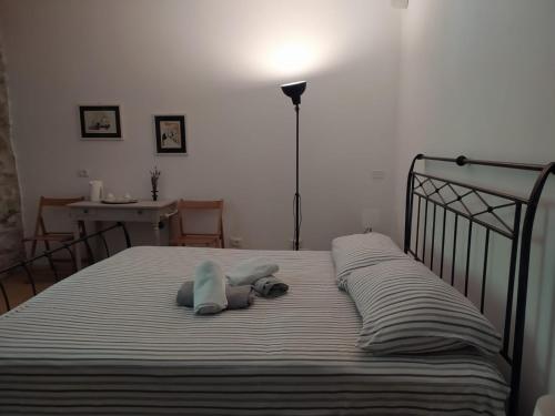Ένα ή περισσότερα κρεβάτια σε δωμάτιο στο Casa del Vicolo