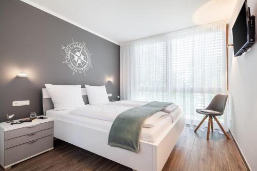 Katil atau katil-katil dalam bilik di "Deichhausener Straße 2" Wohnung Senator, 1 OG