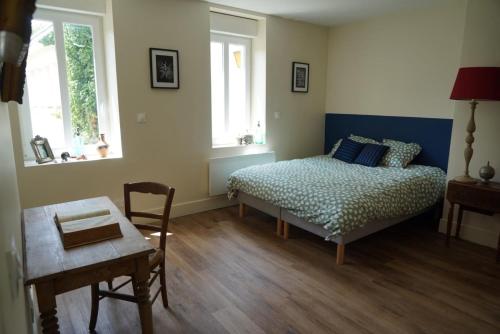 Giường trong phòng chung tại La Galerie