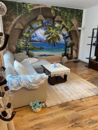 a living room with a couch and a table at City Tales Residence in Braşov