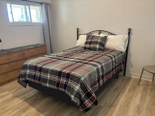 Postel nebo postele na pokoji v ubytování Chambre 4 Gestion Clin D Oeil