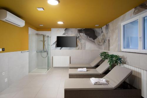 Istumisnurk majutusasutuses Villa Isla Verde for 10 people with private pool & sauna only 10 meters from the sea