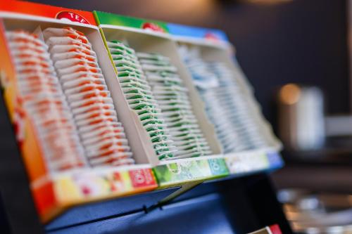 a close up of a bunch of different colored brushes at Sleephotels Cosmos in Hamburg