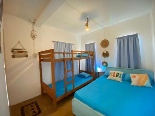 Postel nebo postele na pokoji v ubytování Philipp's Beachfront Cabin - Calatagan