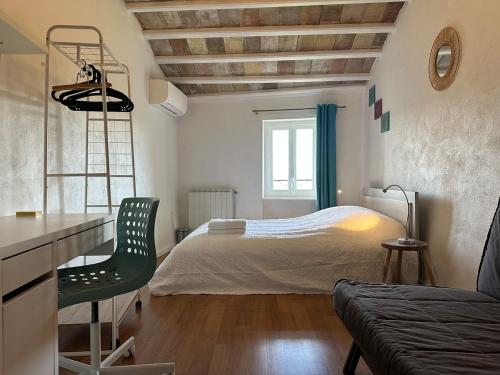 Ένα ή περισσότερα κρεβάτια σε δωμάτιο στο La maison de la Tour
