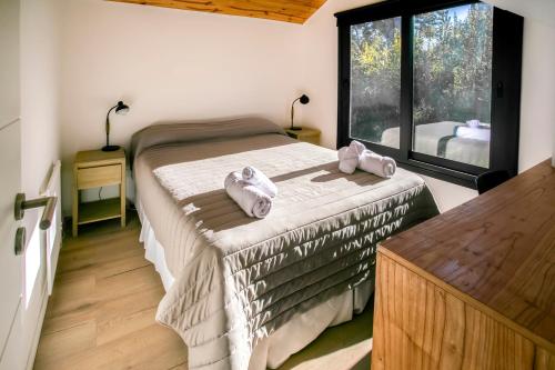 Postel nebo postele na pokoji v ubytování BOG Casas Henko