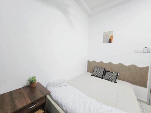 Postel nebo postele na pokoji v ubytování Ipoh town horizon 3br 6pax