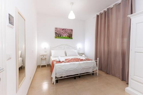 Cama o camas de una habitación en ApartHotel Mialma - Salento Reservation