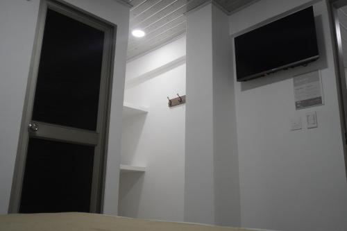 TV a/nebo společenská místnost v ubytování Hotel Gama Cartagena