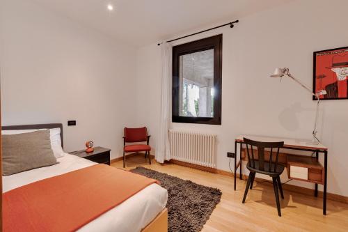 Ένα ή περισσότερα κρεβάτια σε δωμάτιο στο Garden Apartments Sistiana