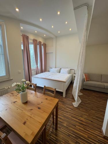Ένα ή περισσότερα κρεβάτια σε δωμάτιο στο Vila Urbana Luxury Apartments