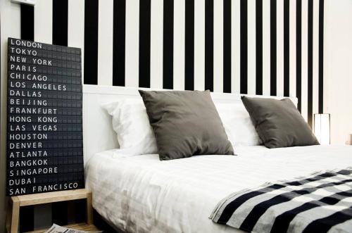 Ένα ή περισσότερα κρεβάτια σε δωμάτιο στο Goodfellas Thong lo Hostel #Check in time needed#