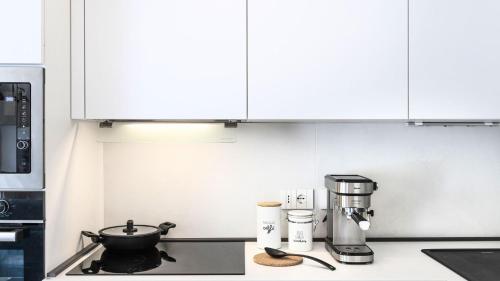 Una cocina o cocineta en Elyanas Home