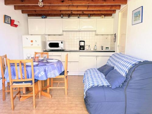 Kuchyň nebo kuchyňský kout v ubytování Ty Foc - Maisonnette en bord de mer - Jardin & Tennis