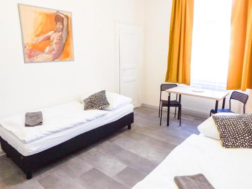 Postel nebo postele na pokoji v ubytování Pokoj v Pražských Holešovicích C1