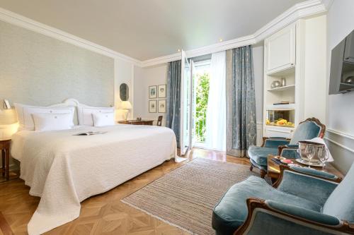Postel nebo postele na pokoji v ubytování Colombi Hotel