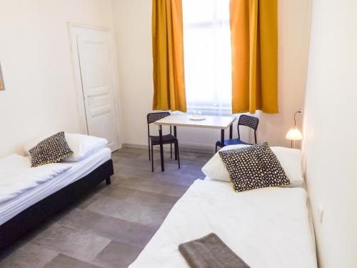 Postel nebo postele na pokoji v ubytování Pokoj v Pražských Holešovicích C1