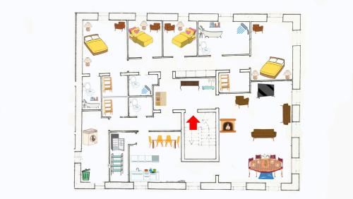 a floor plan of a house with furniture at Große Wohnung mit Garagenparkplatz in Vols am Schlern
