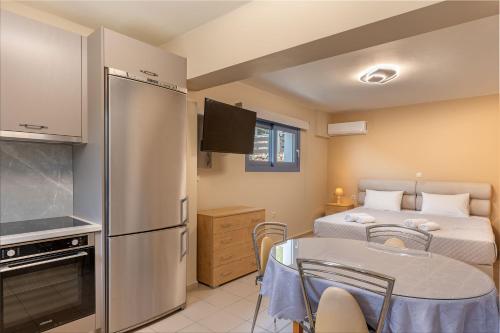 Η κουζίνα ή μικρή κουζίνα στο Makis Dream Apartments - Antigoni