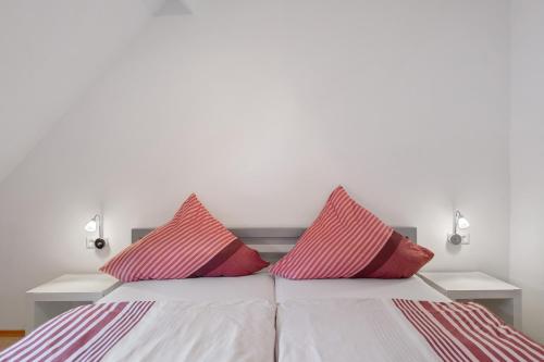 Letto o letti in una camera di Ferienwohnung Reinhardt