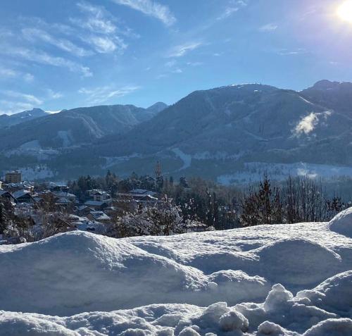 a pile of snow on top of a mountain at Apartment Fiemme Valley in Carano
