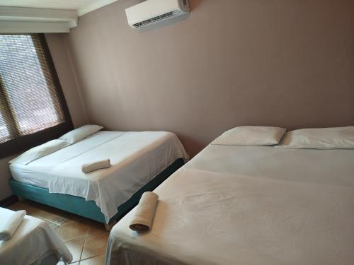 Postel nebo postele na pokoji v ubytování Hotel Milan Cartagena