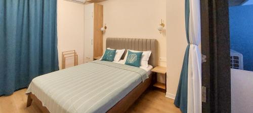 Katil atau katil-katil dalam bilik di 3-Room Seaview Apartment at Bamboo Beach