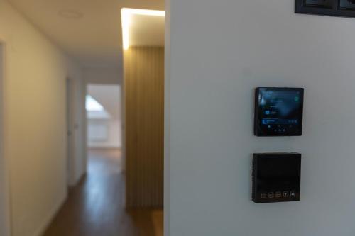 Μια τηλεόραση ή/και κέντρο ψυχαγωγίας στο Apartamentos sarmiento - ático