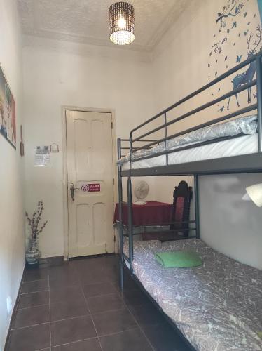Katil atau katil-katil dalam bilik di Perfect Room Near Airport 2