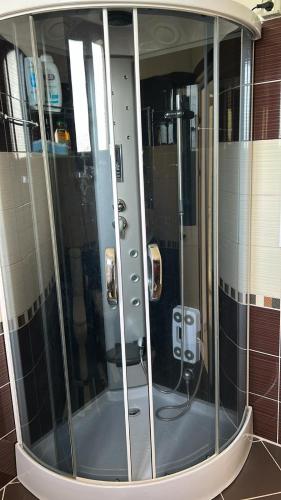 a large shower in a bathroom with glass at Vila Mehalla in Arape-Rashbulli