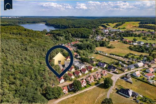 an overhead view of a suburb with a house in a heart at Waldsiedlung DHH Waldhaus 5 in Korswandt