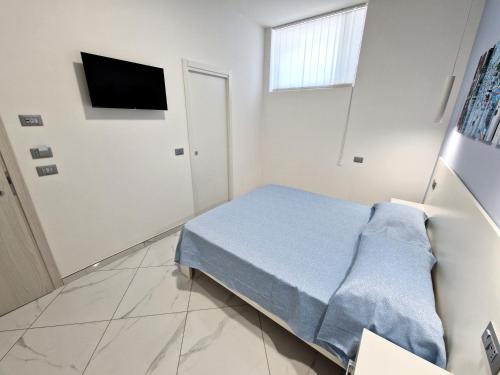 Al 211 Roomsにあるベッド