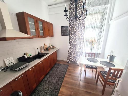 Kuchyň nebo kuchyňský kout v ubytování Apartament Zakątek Centrum
