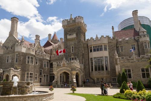 a castle with a canadian flag in front of it at Holiday Inn Toronto International Airport by IHG in Toronto