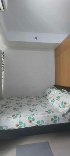 Ένα ή περισσότερα κρεβάτια σε δωμάτιο στο Staycation