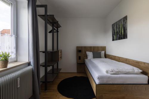 Postel nebo postele na pokoji v ubytování WORK N LIVE Fühl Dich zu Hause