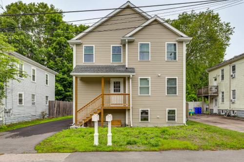 a house with two parking meters in front of it at 2 Mi to Dtwn Attleboro Pet-Friendly Apt! in Attleboro