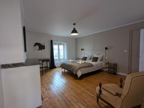 Postel nebo postele na pokoji v ubytování Carcassonne Bastide Appartements