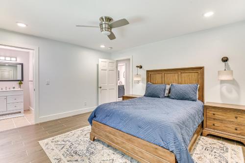 a bedroom with a bed and a ceiling fan at Fish and Swim Home with Catskill Creek Views! in East Durham